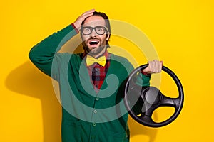 Photo of young funny gentleman guy brunet hair wear green jumper touch forehead panic steering wheel car accident