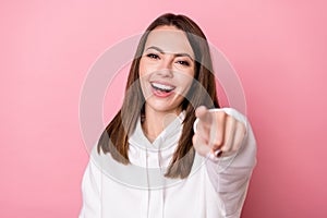 Photo of young girl happy positive smile point finger joy laughing accuse isolated over pink color background