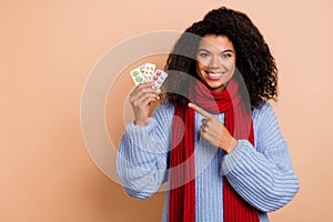 Photo of young girl indicate finger meds pills recommend select promo isolated over beige color background