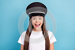 Photo of young happy excited crazy screaming little girl in pilot cap see huge sale  on blue color background
