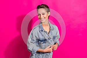 Photo of young happy joyful happy woman smile good mood wear denim casual jacket isolated on pink color background