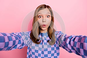 Photo of young impressed girl stupor face reaction shoot selfie blogger isolated over pink color background