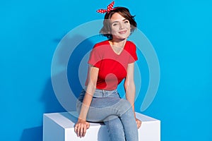 Photo of young lovely woman enjoy dream think wear modern outfit isolated over blue color background