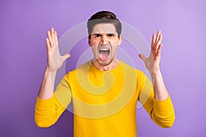 Photo of young man unhappy sad upset yell scream angry accuse conflict problem isolated over violet color background