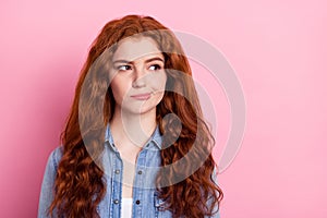 Photo of young pretty girl think ponder minded look empty space isolated over pink color background