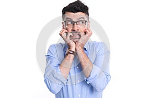 photo of young scared man in panic. scared man in panic isolated on white background.