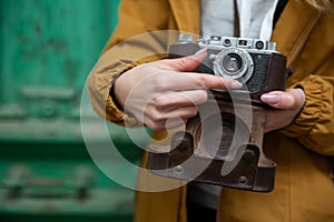 Photo of young tourist girl exploring streets of Baku. Moody photos of teenager girl visiting old city and taking photos