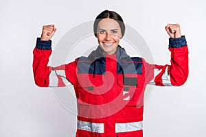Photo of young woman happy positive smile paramedic first aid show hand power hero isolated over white color background