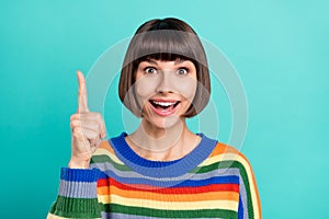 Photo of young woman happy positive smile point finger idea genius creative choice isolated over turquoise color