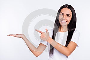 Photo of young woman happy smile look indicate finger product offer advice select isolated over white color background