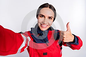 Photo of young woman paramedic happy positive smile make selfie show thumb-up like cool advert isolated over white color