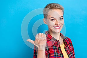 Photo of youngster promoter freelance seo worker woman wear red plaid shirt direct thumb empty space information