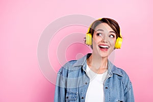 Photo of youngster relaxed girl wear denim stylish jacket looking mockup itunes enjoy her new bluetooth headphones