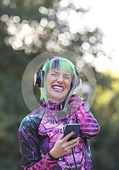 Photo16. A smiling beautiful lady listens to music.