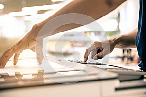 Photocopier printer, Close up hand office man press copy button on panel to using the copier or photocopy machine for scanning