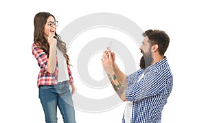 Photogenic concept. Happy little girl posing white background. Smartphone camera. Camera optical zoom. Powerful camera