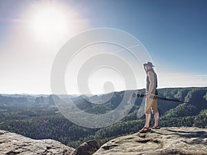 Photograper artist wear cowboy hat and shadowing eyes