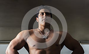 Photograph of athlete in contrapicado to highlight the volume of his body. photo