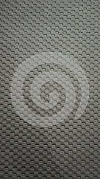 Photograph of a close up of a black patterned fabric