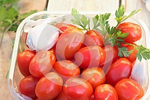 Photograph of Comer and Tomatoes Tomatoes in a Bol. photo