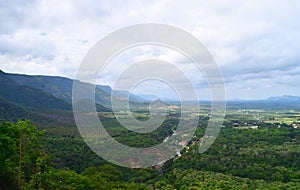 Landscape in Theni, Tamilnadu, India - Natural Background with HIlls, Greenery and Sky photo