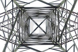 Photograph looking up internally through a large steel electrical transmission tower