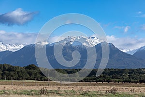 Photograph of the mountain range view while driving from Te Anau to Manapouri in New Zealand