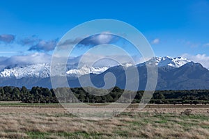 Photograph of the mountain range view while driving from Te Anau to Manapouri in New Zealand