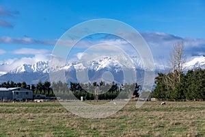 Photograph of the mountain range view while driving from Te Anau to Manapouri in New Zealand