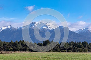 Photograph of the mountain range view while driving from Te Anau to Manapouri in New Zealand