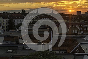 Orange sky at sunset in Berlin, Germany photo