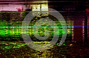 photograph of a paved road during the rain. background photo