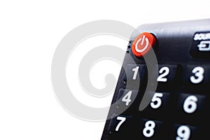 Photograph of the power button of a television remote control