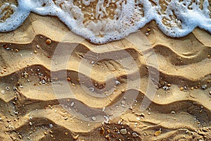 Photograph of sand texture background, top view of beach sand with small waves