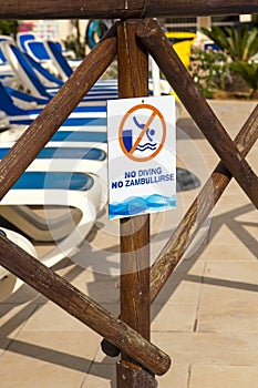 Photograph of sign saying no diving