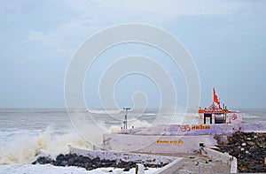 Temple on an Island in Sea surrounded by Stormy Oceanic Wind Waves during Vayu Cyclone - Devbhumi Dwarka, Gujarat, India