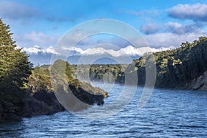 Photograph the Waiau River from the Kepler Track swing bridge while driving from Te Anau to Manapouri in New Zealand