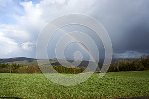 photographed a colorful rainbow in spring in april in germany.