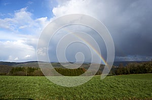 photographed a colorful rainbow in spring in april in germany.