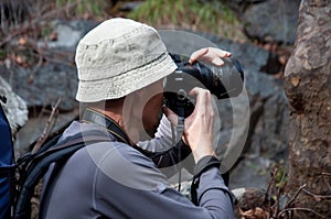 Photographer action in the pine forest of Cyprus