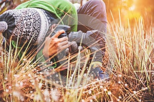 Photographer  asian woman travel  nature. Travel relax. Photography Nature Flowers. Nature Study in the Jungle. Thailand