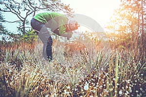 Photographer  asian women travel  nature. Travel relax. Photography Nature Flowers. Nature Study in the Jungle. Thailand