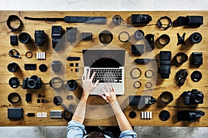 Photographer with camera equipment aerial view