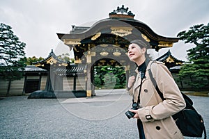 Photographer cheerfully visiting the temple