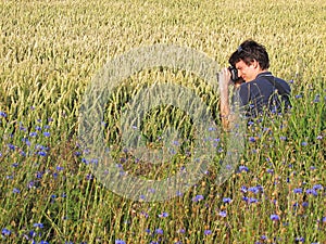 Photographer in cornfield