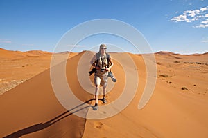 Photographer in the desert photo