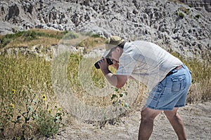 Photographer getting the perfect shot of sunflower