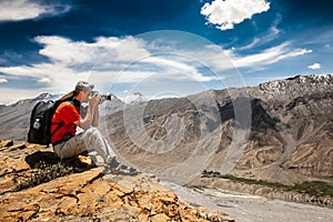 Photographer on the high mountain