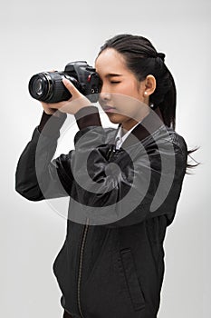 Photographer hold camera with external flash point