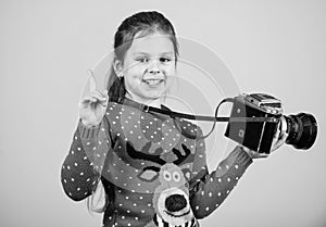 Photographer hold retro camera. Classes for kids. Learn to take photos with dslr camera. Photography courses. Education